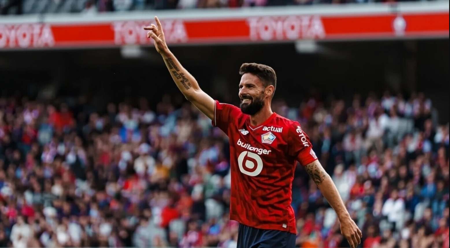 Жиру празднует гол за Лилль